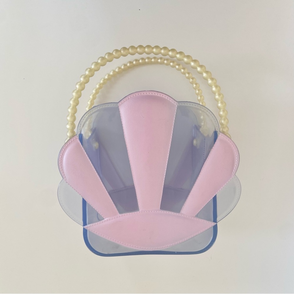 Pearl clam shell statement purse